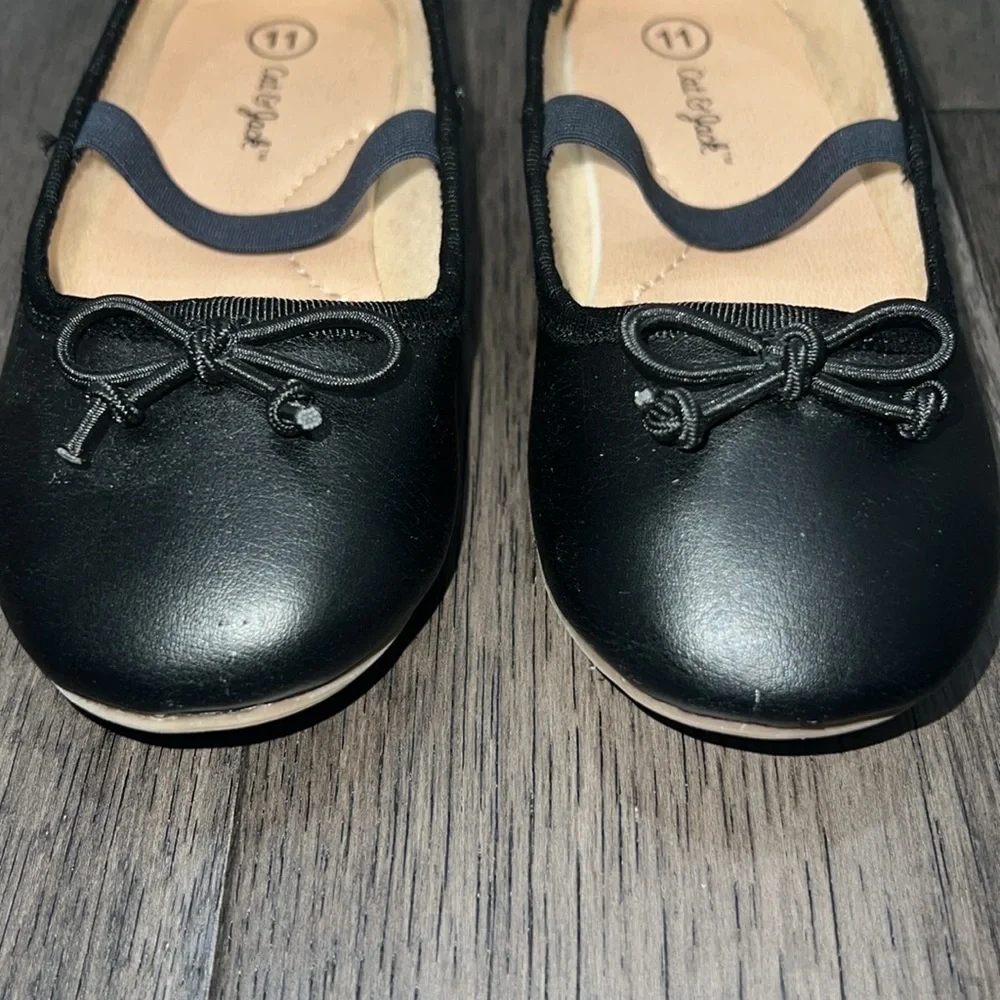 Gently used cat & Jack Mary Jane like flats with a string bow